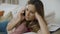 Young woman call phone at home. Portrait of adult woman talking mobile phone