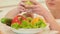 Young woman checking vegetables Organic food