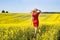 Young woman cheering in the seed field