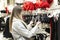 Young woman chooses a sexy bra in a lingerie store. Season of sales and discounts