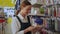 Young woman chooses toothbrush scanning product closeup