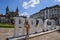 Young woman with a city map in front of the Braga sign text