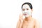 Young woman clay face mask peeling natural
