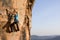 Young woman climbing