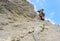 Young woman climbing in the Dolomits