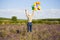 Young woman with colorful ballons