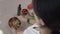 Young woman cooking healthy food In kitchen preparing salad. Female chief cook chopping vegetables, cooking delicious fresh salad