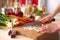 Young Woman Cooking in the kitchen. Healthy Food