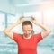 Young woman cool down after workout with cold water bottle. Eyes