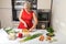 Young woman cutting carrot and preparing for vegetable wok