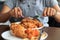 Young woman cutting fried chicken select focus, Fried chicken lunch, Close-up woman hands cutting fried chicken, Eat fried chicken