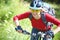 Young woman cyclist in the park