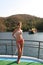 Young Woman on the deck of the yacht