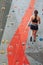 Young woman descending after climbing