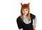 Young woman with devil horns, sly looks