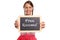 Young woman in a dirndl holding up a blank slate