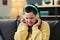 Young Woman With Disability Listening To Music