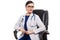 Young woman doctor with stethoscope sitting in medical office in white uniform on white background