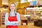 Young woman doing apprenticeship in supermarket