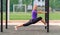 Young woman doing a forward lunge yoga pose