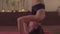 Young woman doing headstand