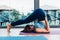 Young woman doing headstand pose yoga