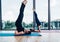 Young woman doing headstand pose yoga