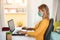 Young woman doing smart work from home during quarantine lockdown isolation - Tecnology, digital job and outbreak concept - Focus