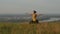 Young woman doing summer yoga on a hill above Novi Sad city, Fruska gora, Serbia.