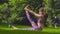 Young woman doing yoga exercises