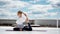 Young woman doing yoga or pilates exercise one legged king pigeon pose