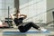 A young woman doing yoga. Sporty woman practicing yoga