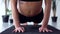 Young woman doing yoga workout at home