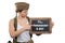 Young woman dressed in american ww2 military uniform showing chalkboard with d-Day anniversary