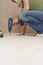 Young Woman Drilling Floor