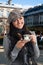 Young woman drink coffee in France