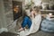 Young woman drinking her coffee in cozy living room