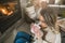 Young woman drinking her coffee in cozy living room