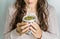 Young woman drinking traditional Argentinian yerba mate tea.