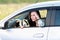 Young woman driving car