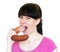 The young woman eat a sausage