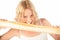 Young woman eating baguette