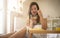 Young woman eating cereal.