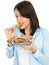 Young Woman Eating Donner Kebab with Salad