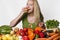 Young woman eating pear