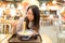 Young Woman eating ramen in restaurant