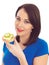 Young Woman Eating Toasted Crumpet with Cheese and Cucumber