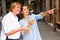 Young woman with elderly mother exploring city sights