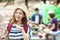 young  woman  enjoy barbecue and camping