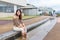 Young Woman enjoy foot onsen with cat at outdoor